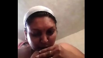 Tamil aunty in bathroom sucking her boobs