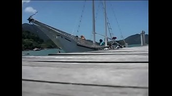 Naghty sunburnt girls in Hawaiian skirts enjoy neverending group sex orgy on the cruising boat