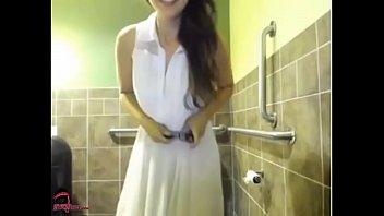 Slut masterbates in public bathroom